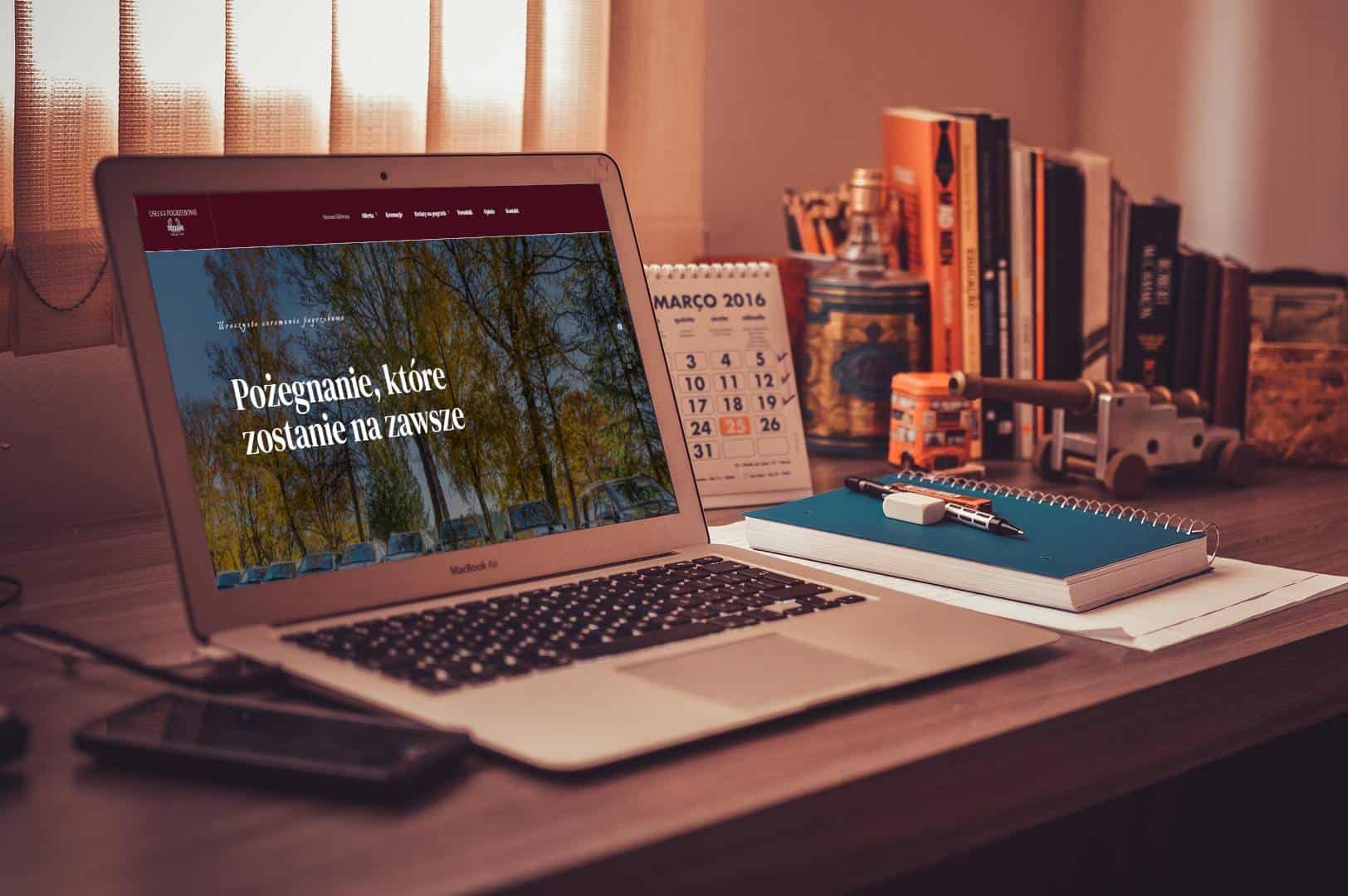 Strona iredar.waw.pl prezentowana na laptopie